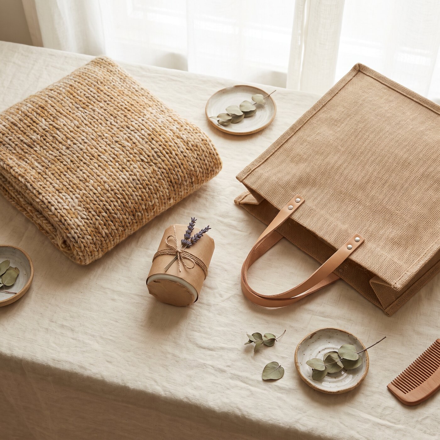 Natural woven tote bag with leather trim