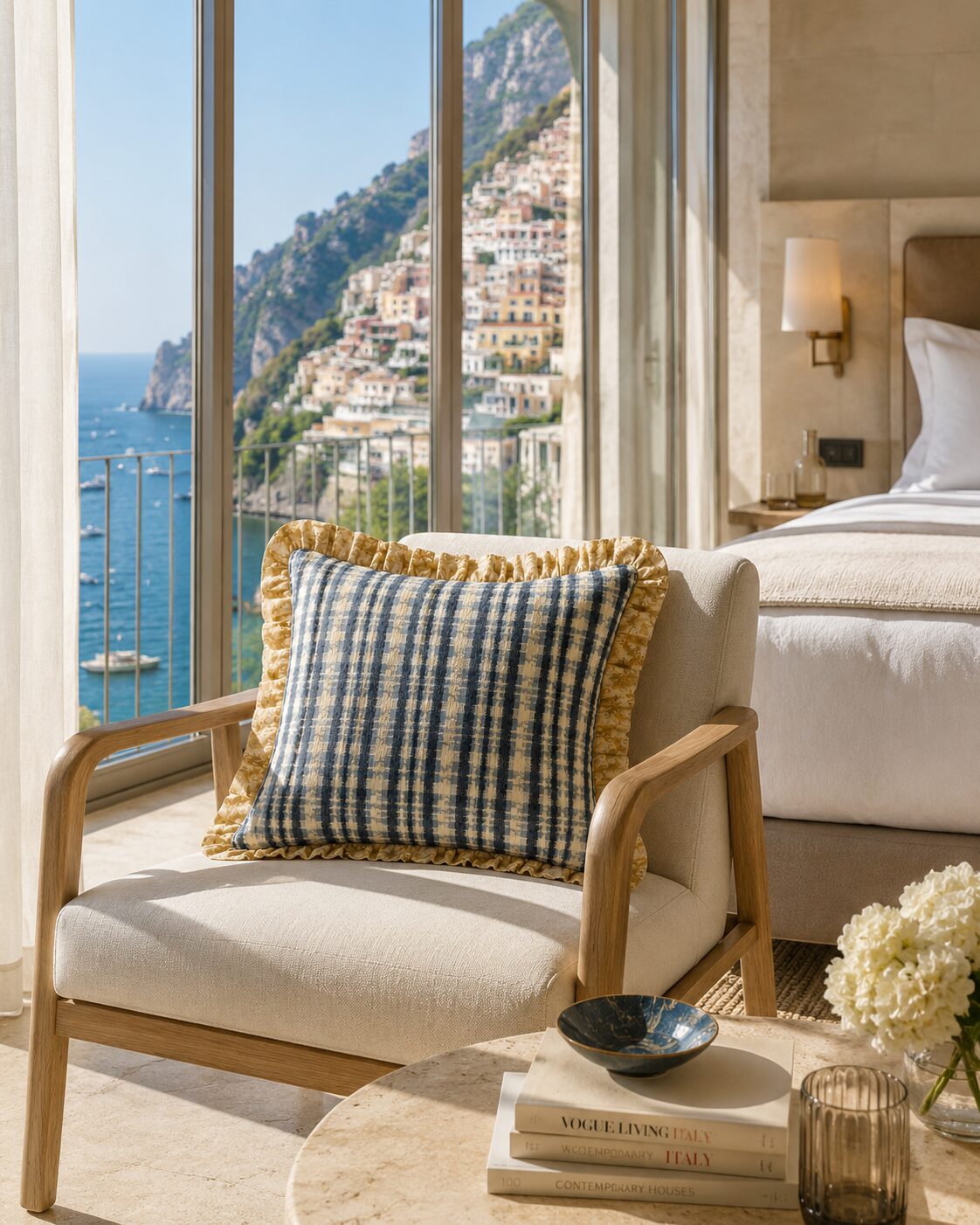 A Penta pillow styled on a coastal terrace chair, overlooking the water